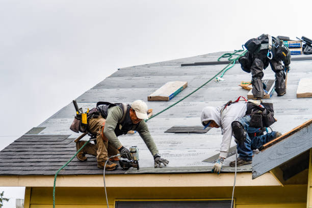 Professional Storm Damage Roof Repair technician working in Mastic Beach, NY